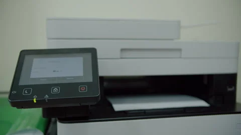 Printed paper coming out of office printer Stock Footage 311183227