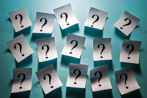 Printed question marks on white cards Stock Photos