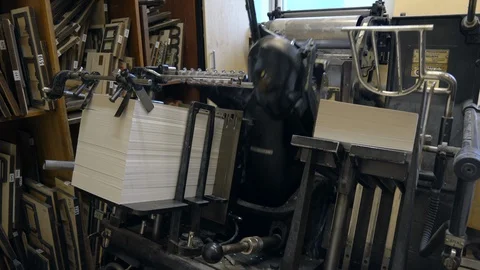 Printed sheets of paper are served in the printing press Stock-Footage 120896278