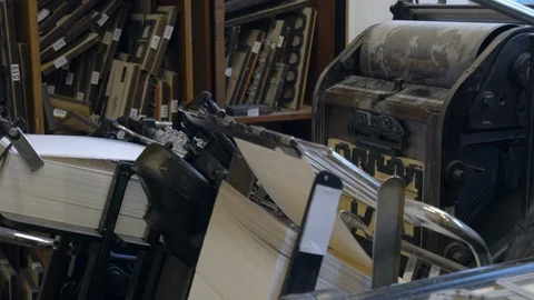 Printed sheets of paper are served in the printing press Stock-Footage 120896873