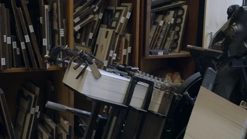 Printed sheets of paper are served in the printing press Stock-Footage 120897145