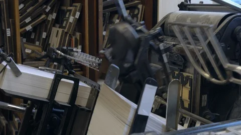 Printed sheets of paper are served in the printing press Stock-Footage 120897171