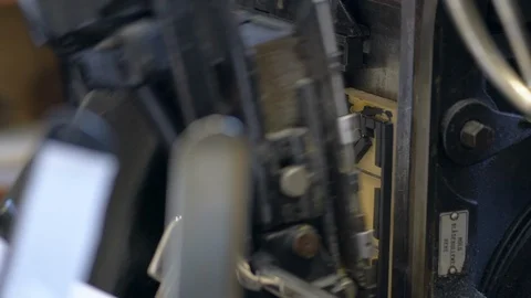 Printed sheets of paper are served in the printing press Stock-Footage 120897226