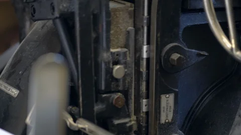 Printed sheets of paper are served in the printing press Stock-Footage 120897405