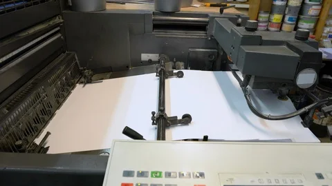 Printed sheets of paper are served in the printing press Stock Footage 120901890