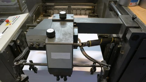 Printed sheets of paper are served in the printing press Stock Footage 120902264