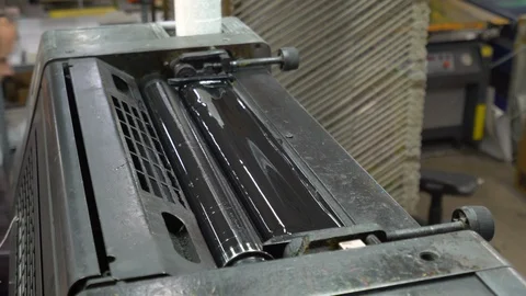 Printed sheets of paper are served in the printing press Stock Footage 120902871