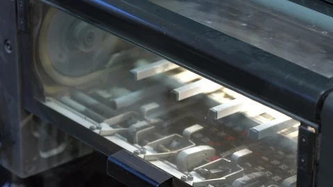 Printed sheets of paper are served in the printing press Stock Footage 120903436