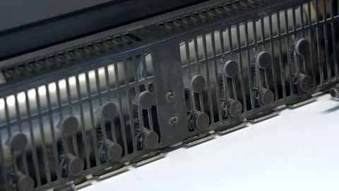 Printed sheets of paper are served in the printing press Stock Footage 120903677