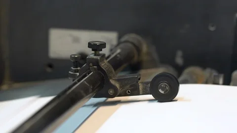 Printed sheets of paper are served in the printing press Stock Footage 120904058