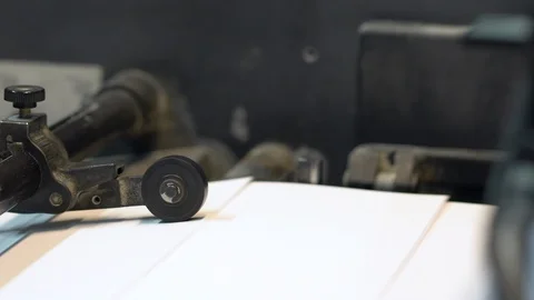 Printed sheets of paper are served in the printing press 库存影片 120904259