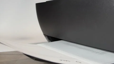 Printer In Action. Paper sheet being printed. Detail shot of black printer Stock Footage 188306872