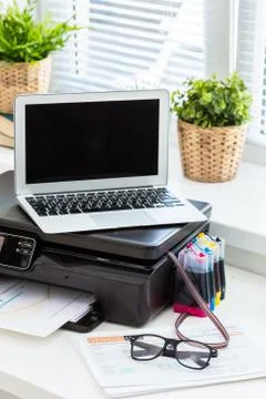 Printer and computer. Office table Stock Photos