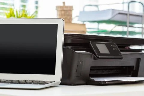 Printer and computer. Office table Stock Photos