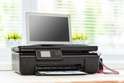 Printer and computer. Office table Stock Photos