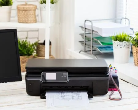 Printer and computer. Office table Stock Photos