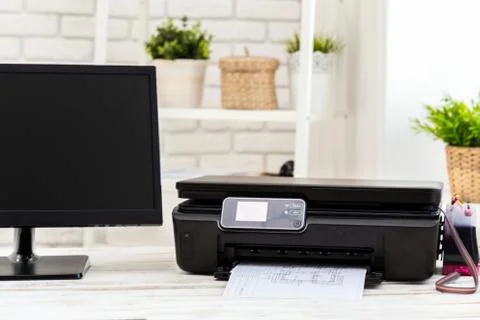 Printer and computer. Office table Stock Photos