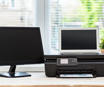 Printer and computer. Office table Stock Photos