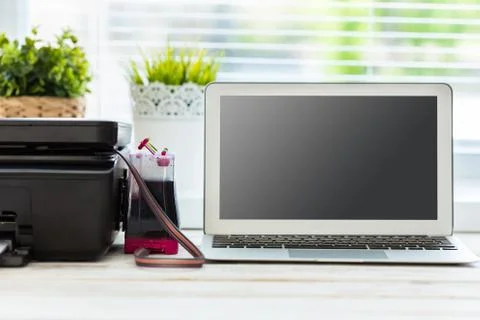 Printer and computer. Office table Stock Photos