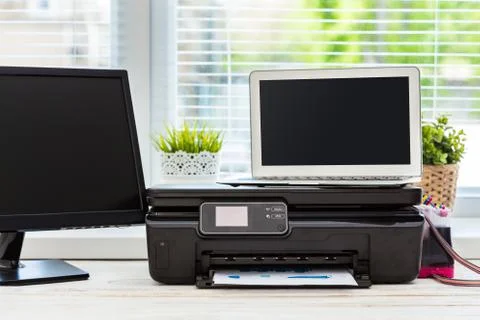 Printer and computer. Office table Stock Photos