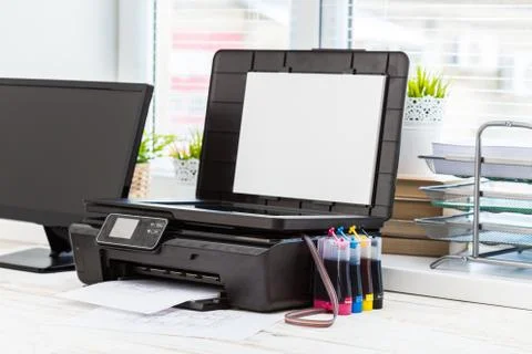Printer and computer. Office table Stock Photos