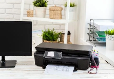Printer and computer. Office table Stock Photos