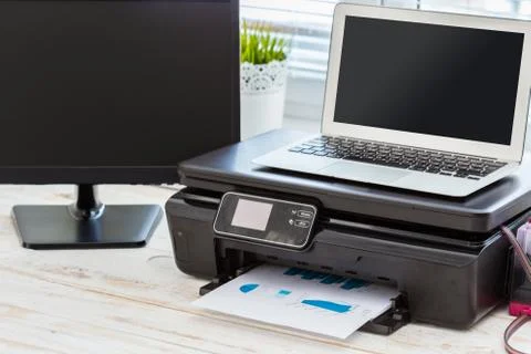 Printer and computer. Office table Stock Photos
