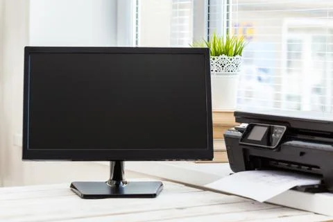 Printer and computer. Office table Stock Photos