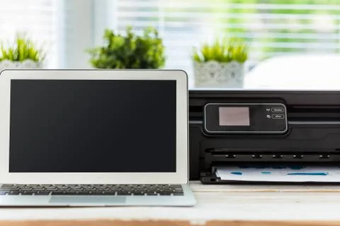 Printer and computer. Office table Stock Photos