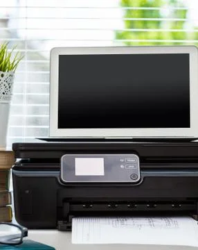 Printer and computer. Office table Stock Photos