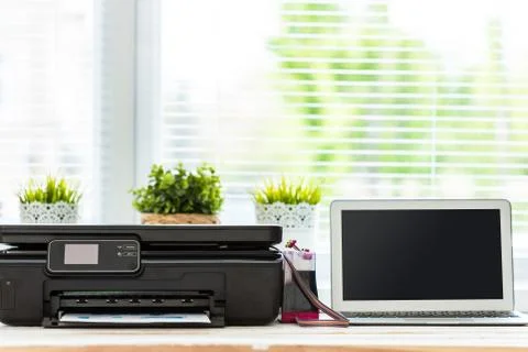 Printer and computer. Office table Stock Photos