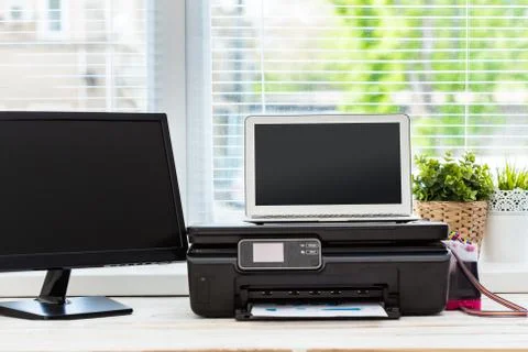 Printer and computer. Office table Stock Photos