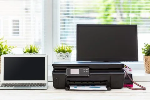 Printer and computer. Office table Stock Photos