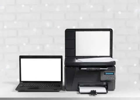 Printer and computer. Office table Stock Photos