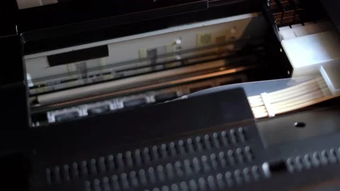The printer carriage is moving. Nozzle cleaning and head test run Stock Footage 156772522