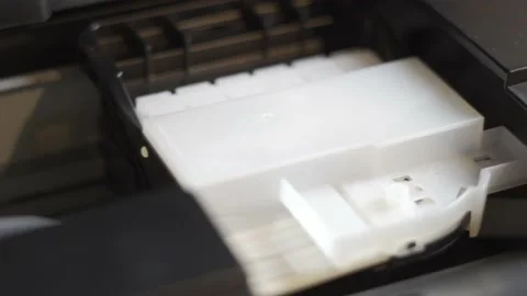 The printer carriage prints in a time-lapse close-up. Background for an article Stock Footage 164028626