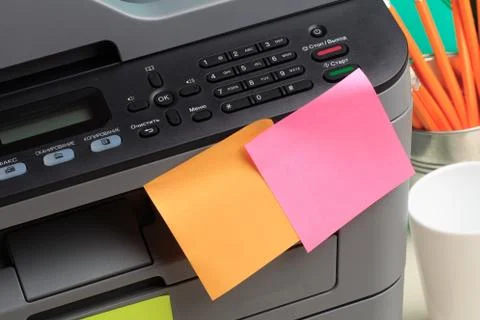 Printer, copier, scanner on color background . Office table Stock Photos