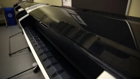 Printer Dolly shot poster art ink printing print shop Stock Footage 74135914