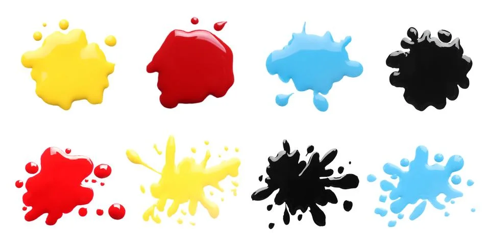 Printer ink of different colors. Set of spots isolated on white, top view Stock Photos