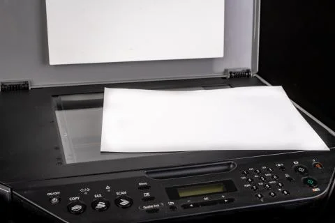 Printer with the option of copying on a dark table. Multifunction device inte Fotos de archivo