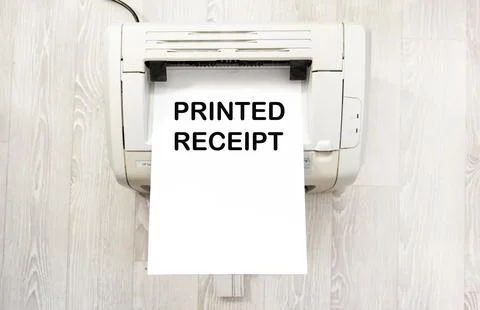 A printer with paper on the printed text Printed Receipt on it Stock Photos