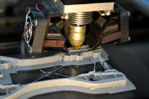 Printer printing gray objects on mirror reflective surface close-up top view Foto stock