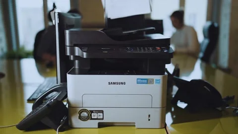 The printer prints 1 sheet, a multifunctional device Stock Footage 170088240