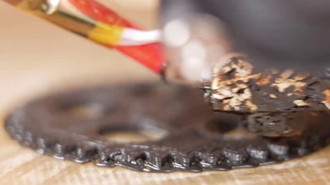 The printer prints the gear. A layer by layer appears on the desktop Video stock 77952740