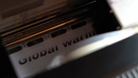 Printer prints global warming headline Stock Footage 163743171