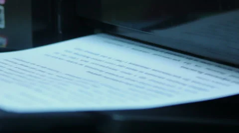 The printer prints text on paper Stock Footage 60744441