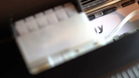The printer prints the word ecology on a white sheet of paper 動画素材 157301216