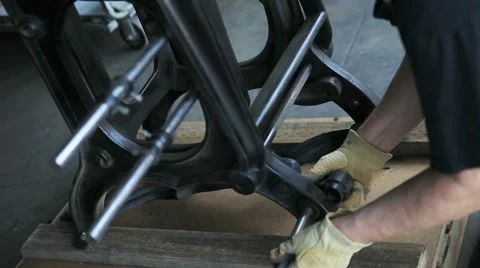 Printer puts together cast iron letterpress Stock Footage 61608120