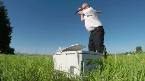 Printer repairman getting revenge with a baseball bat Stock Footage 60057505