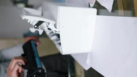 Printer repairman inspecting printer interior. Concept of professional printer 動画素材 289773576